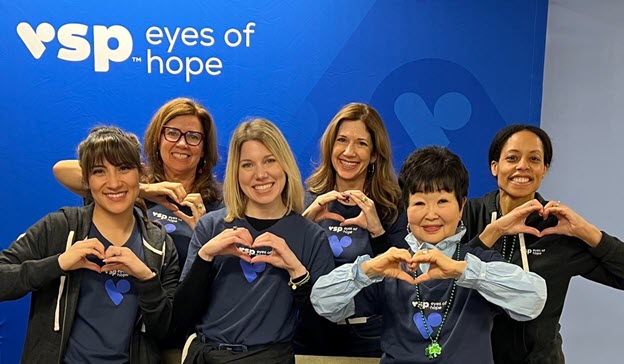 Give Help Image of VSP Vision employees as MRTs making a heart image