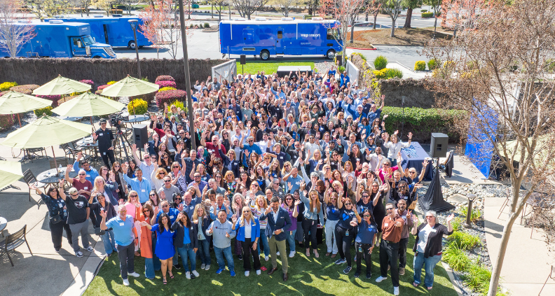Outside group drone photo of VSP Vision employees at VSP Vision headquarters 